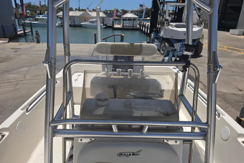 Slide: The Image of 2021 Bulls Bay 2200 boat docked at marina with clear view of console. - 70