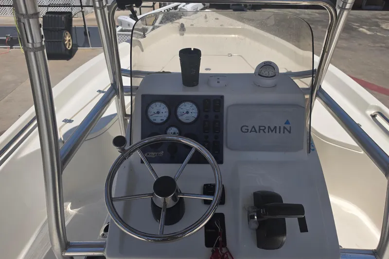 Slide: The Image of 2021 Bulls Bay 2200 boat console with Garmin navigation system and steering wheel. - 33