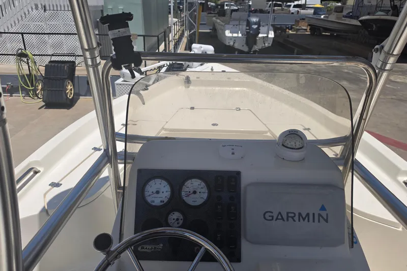 Slide: The Image of 2021 Bulls Bay 2200 boat dashboard with Garmin navigation system and gauges. - 32
