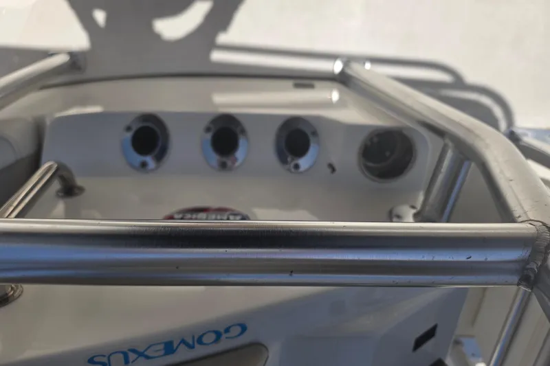Slide: The Image of Close-up of 2021 Bulls Bay 2200 boat console with stainless steel railings. - 79