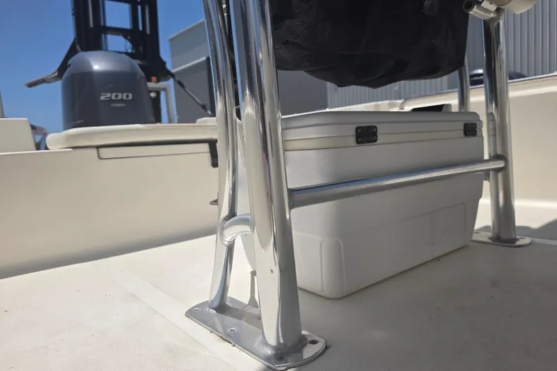 Slide: The Image of 2021 Bulls Bay 2200 boat interior with cooler and Yamaha 200 engine. - 76