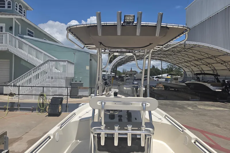 Slide: The Image of 2021 Bulls Bay 2200 boat docked at marina with canopy and equipment. - 22