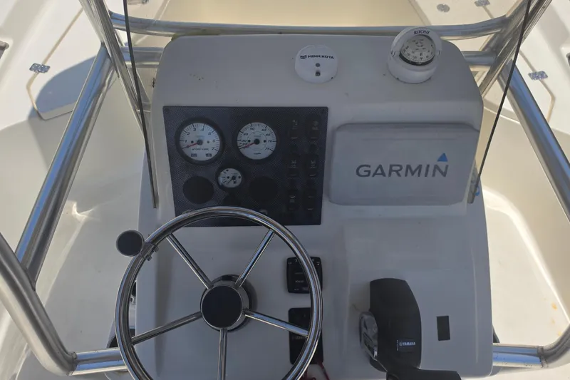 Slide: The Image of 2021 Bulls Bay 2200 boat console with Garmin navigation and steering wheel. - 42