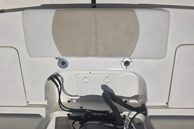 Slide: The Image of Bulls Bay 2200 boat interior, 2021 model, featuring seating and control panel. - 80