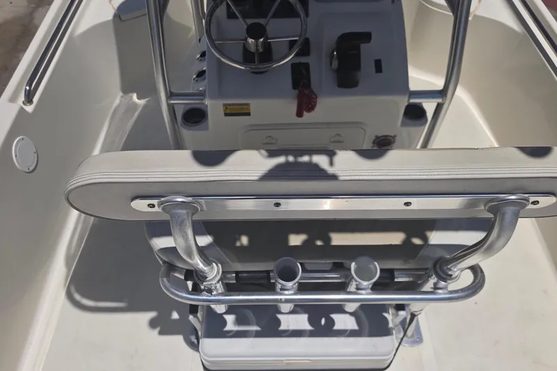 Slide: The Image of 2021 Bulls Bay 2200 boat interior with steering console and seating. - 26
