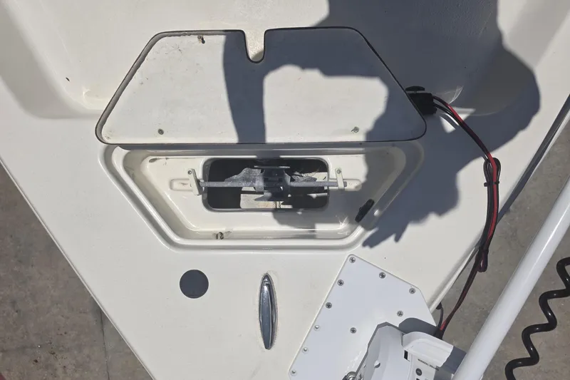 Slide: The Image of 2021 Bulls Bay 2200 boat deck with open hatch and wiring. - 69