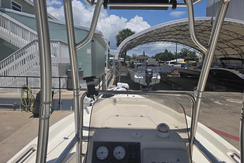 Slide: The Image of 2021 Bulls Bay 2200 boat at marina, view from helm, clear sky. - 41