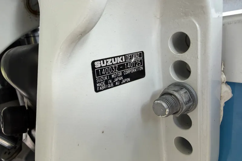Slide: The Image of Close-up of Suzuki motor label on 2021 Campion Allante 180 boat. - 24