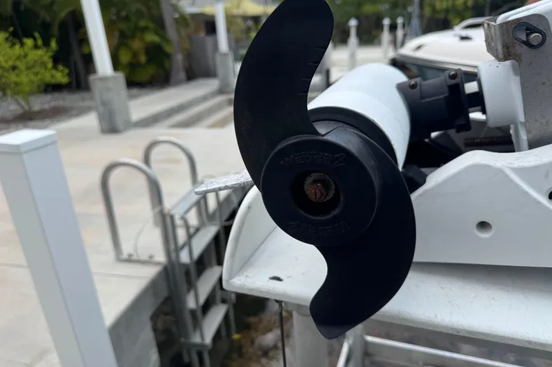 Slide: The Image of Close-up of a 2021 Grady-White 251 Coastal Explorer boat propeller at a dock. - 45