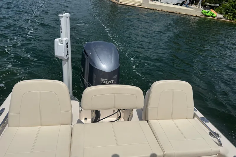 Slide: The Image of 2021 Grady-White 251 Coastal Explorer boat with Yamaha 300 engine on water. - 47