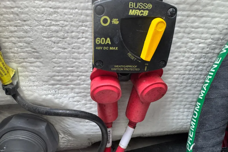 Slide: The Image of Weatherproof 60A circuit breaker on 2021 Grady-White 251 Coastal Explorer boat. - 90