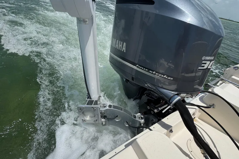 Slide: The Image of 2021 Grady-White 251 Coastal Explorer with Yamaha 300 outboard motor in action on water. - 84