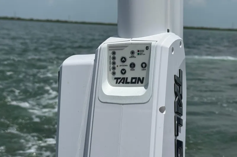 Slide: The Image of Control panel of a 2021 Grady-White 251 Coastal Explorer boat on water. - 83