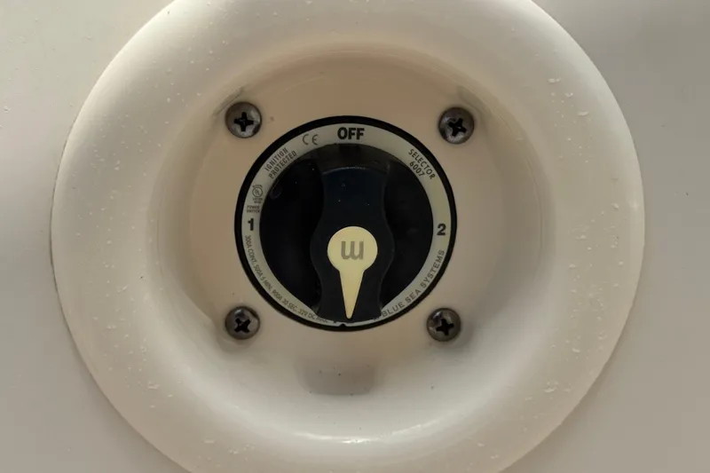 Slide: The Image of Battery selector switch on 2021 Grady-White 251 Coastal Explorer boat. - 52