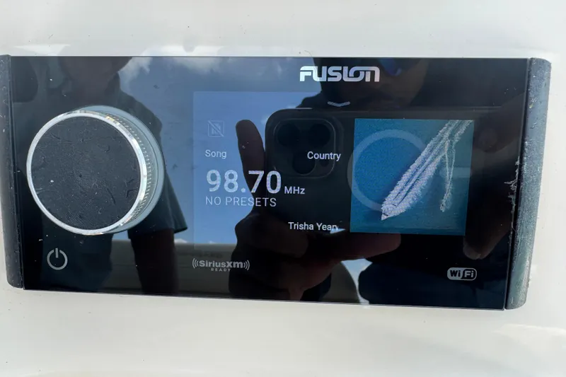 Slide: The Image of Fusion stereo display on 2021 Grady-White 251 Coastal Explorer boat. - 85