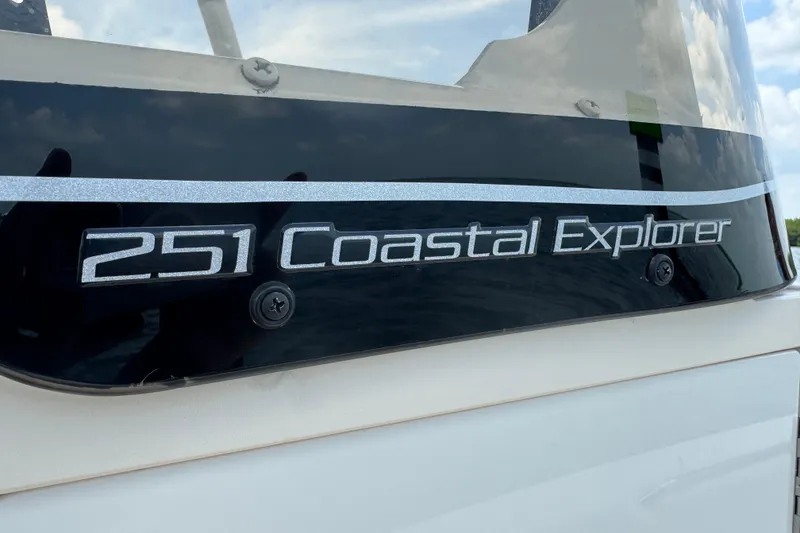 Slide: The Image of 2021 Grady-White 251 Coastal Explorer boat nameplate with sleek design. - 68