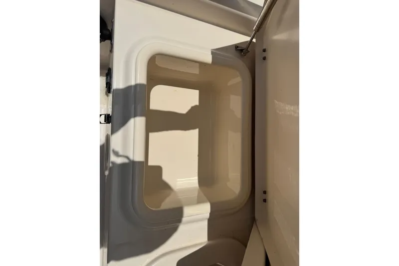 Slide: The Image of Storage compartment inside 2021 Grady-White 251 Coastal Explorer boat. - 56