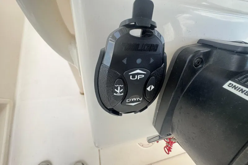 Slide: The Image of Remote control for Talon anchor system on 2021 Grady-White 251 Coastal Explorer boat. - 94
