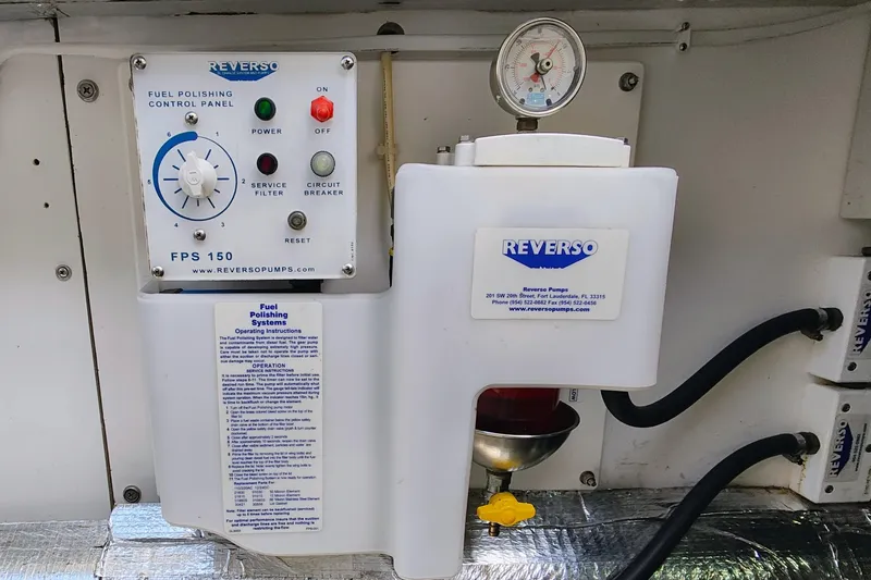 Slide: The Image of Fuel polishing control panel on a 2009 Maine Cat P-47 boat. - 62