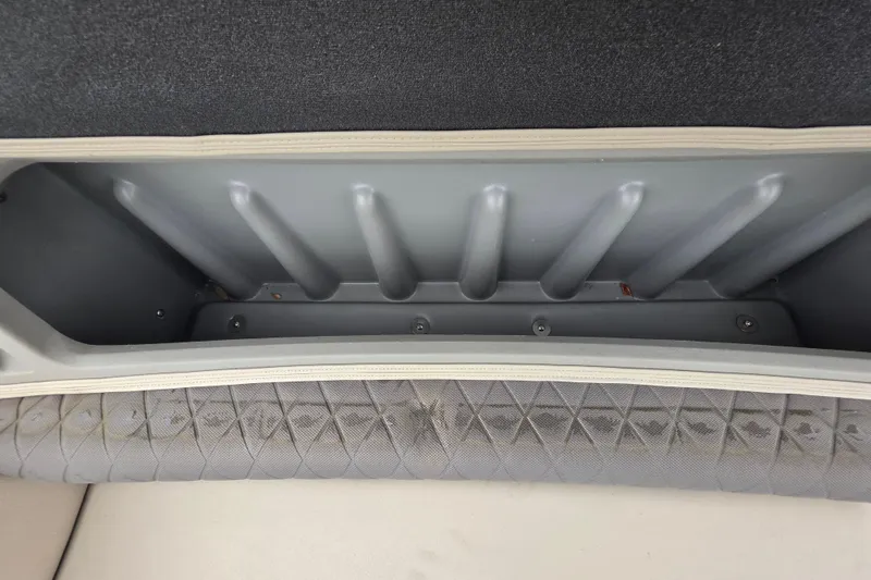 Slide: The Image of Storage compartment in 2023 Sun Tracker Bass Buggy 18 DLX boat interior. - 56