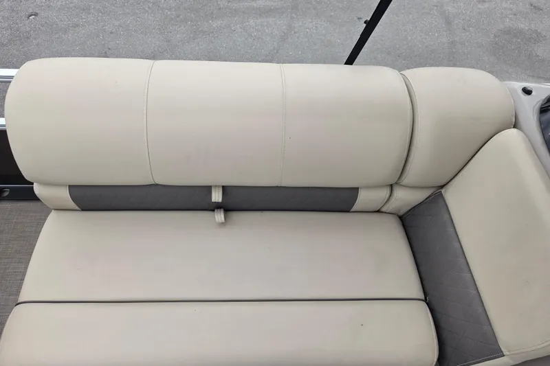 Slide: The Image of 2023 Sun Tracker Bass Buggy 18 DLX beige and gray boat seating detail. - 40