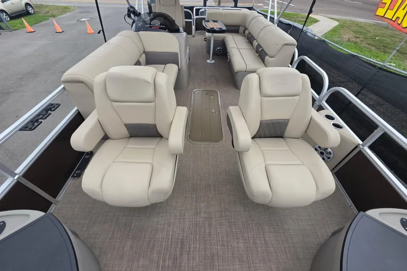 Slide: The Image of 2023 Sun Tracker Bass Buggy 18 DLX pontoon boat with spacious seating and modern design. - 36