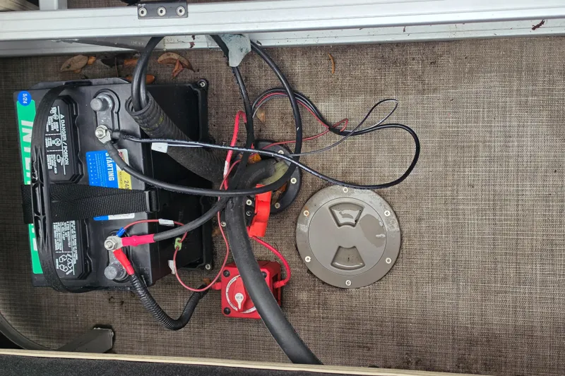 Slide: The Image of Battery and wiring setup on 2023 Sun Tracker Bass Buggy 18 DLX boat. - 48