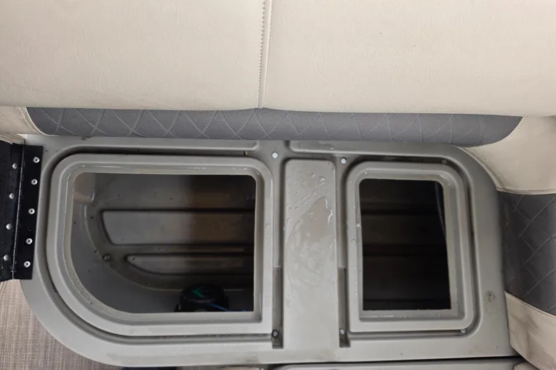 Slide: The Image of Interior view of 2023 Sun Tracker Bass Buggy 18 DLX boat, featuring seating and storage. - 53