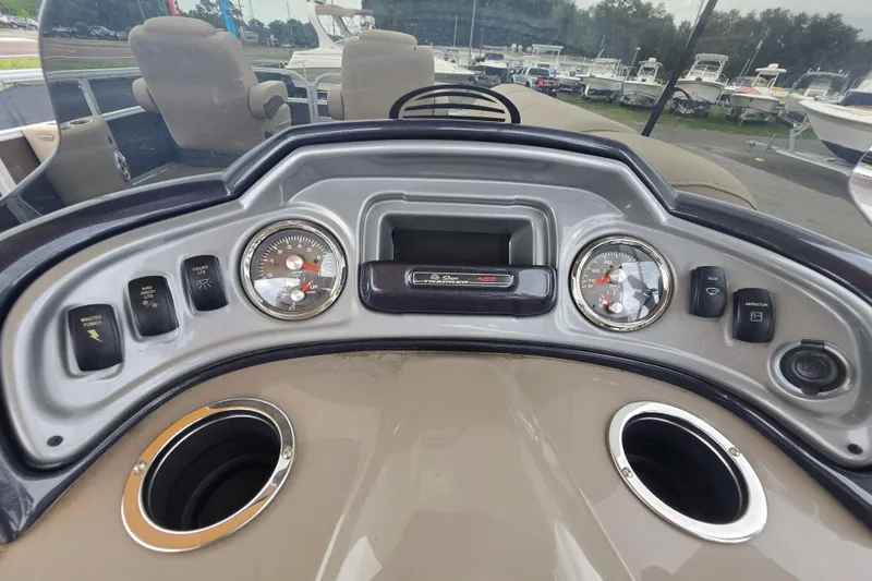 Slide: The Image of Dashboard of 2023 Sun Tracker Bass Buggy 18 DLX pontoon boat with gauges and controls. - 20