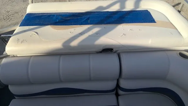 Slide: The Image of The 2008 Manitou OASIS 20 seats show wear and are patched with blue tape. - 10