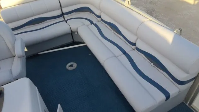 Slide: The Image of Interior view of a 2008 Manitou OASIS 20 with blue and white seating. - 8