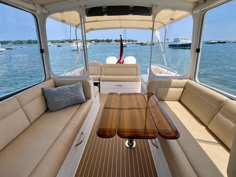 Slide: The Image of Spacious interior of 2019 MJM 35z yacht with elegant seating and wooden table. - 21