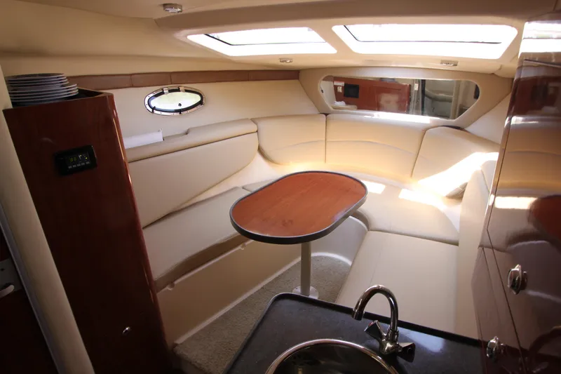 Slide: The Image of Innenraum der Regal 2860 Window Express 2011 mit beigem Sofa und Holztisch. - 14