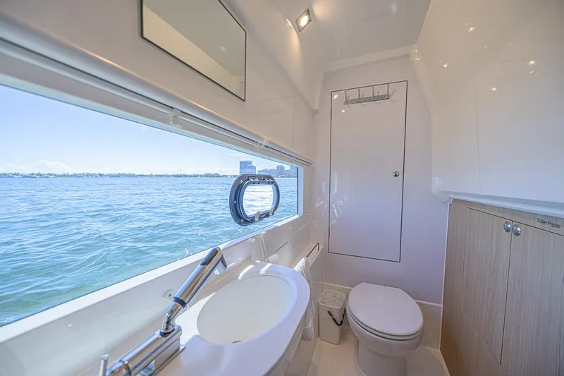 Slide: The Image of Luxurious bathroom interior of 2024 Aquila 36 Sport yacht with ocean view. - 45