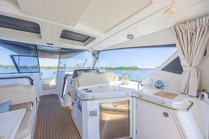 Slide: The Image of Luxurious interior of 2024 Aquila 36 Sport yacht with scenic water views. - 29