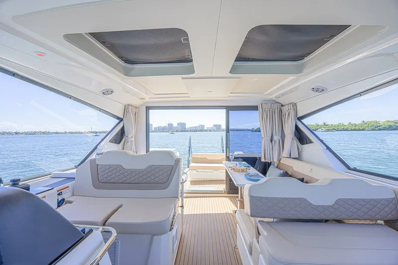 Slide: The Image of Luxurious interior of 2024 Aquila 36 Sport yacht with scenic ocean view. - 27