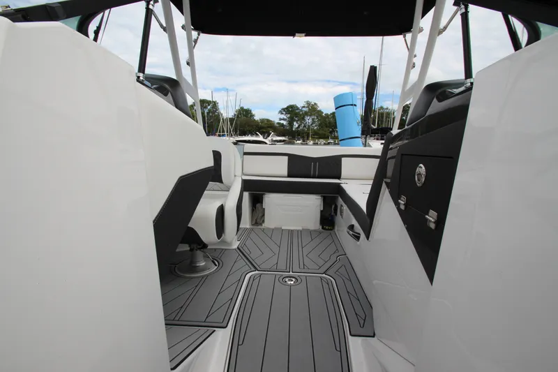 Slide: The Image of 2025 Monterey M-22 boat interior with sleek seating and modern design. - 25