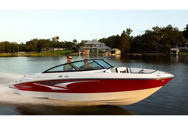 Slide: The Image of Manufacturer Provided Image: 2025 Monterey M-22 boat cruising on a serene lake with lush greenery in the background. - 7