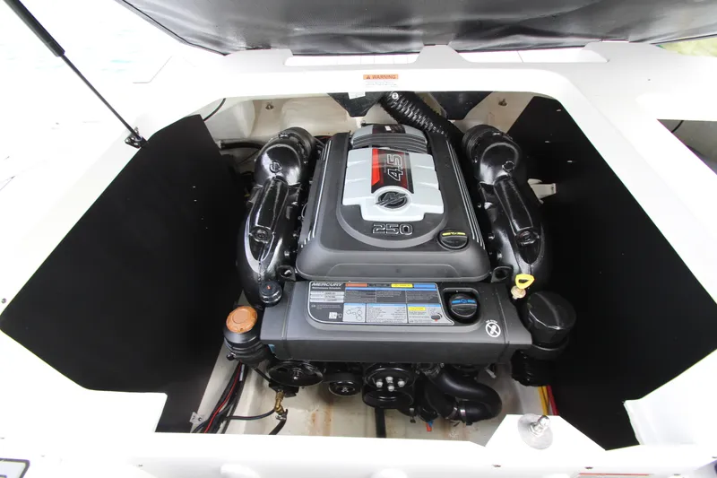Slide: The Image of Engine compartment of 2025 Monterey M-22 boat, featuring a powerful Mercury 4.5L engine. - 22