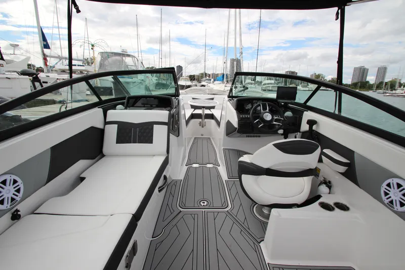 Slide: The Image of Luxurious 2025 Monterey M-22 boat interior with sleek seating and modern dashboard. - 9