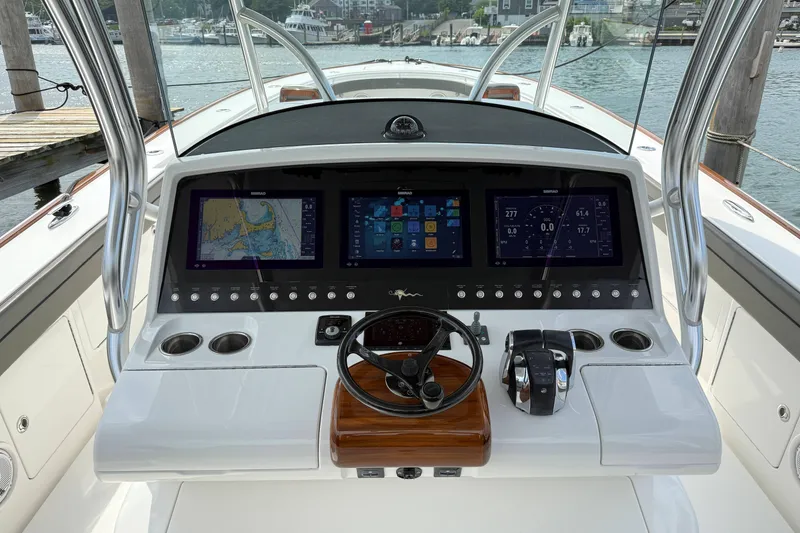 Slide: The Image of 2021 Valhalla Boatworks V-41 helm with advanced navigation displays and controls. - 19