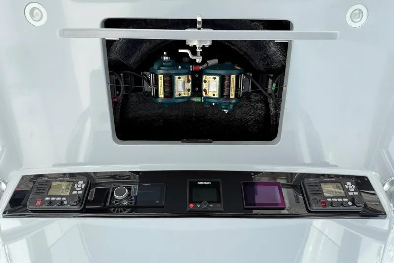 Slide: The Image of 2021 Valhalla Boatworks V-41 control panel with advanced navigation and communication systems. - 29