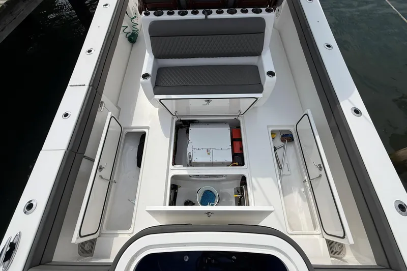 Slide: The Image of 2021 Valhalla Boatworks V-41 deck with storage compartments and seating. - 28