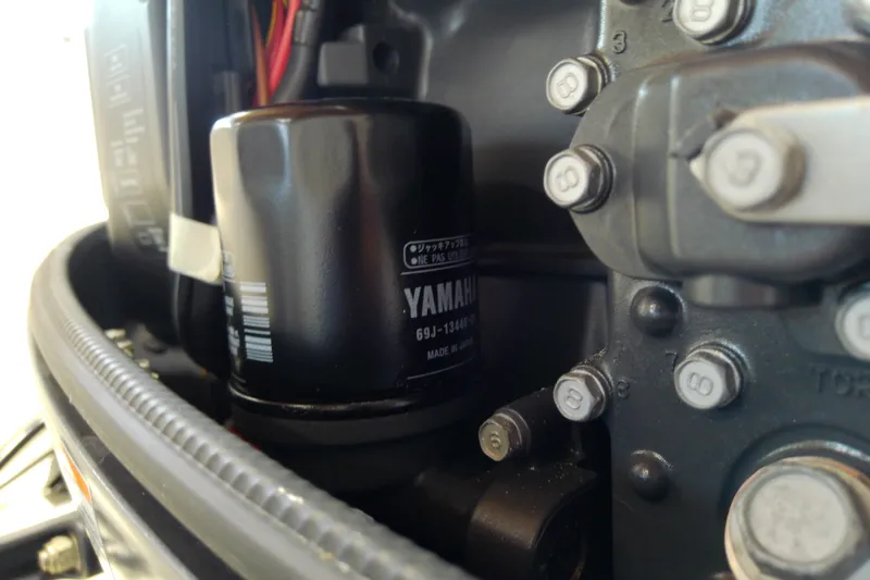 Slide: The Image of Close-up of Yamaha engine components on a 2012 Hurricane SunDeck 217 OB boat. - 42