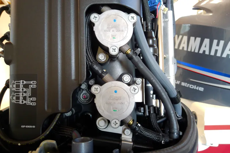 Slide: The Image of Close-up of a Yamaha outboard motor on a 2012 Hurricane SunDeck 217 OB boat. - 40