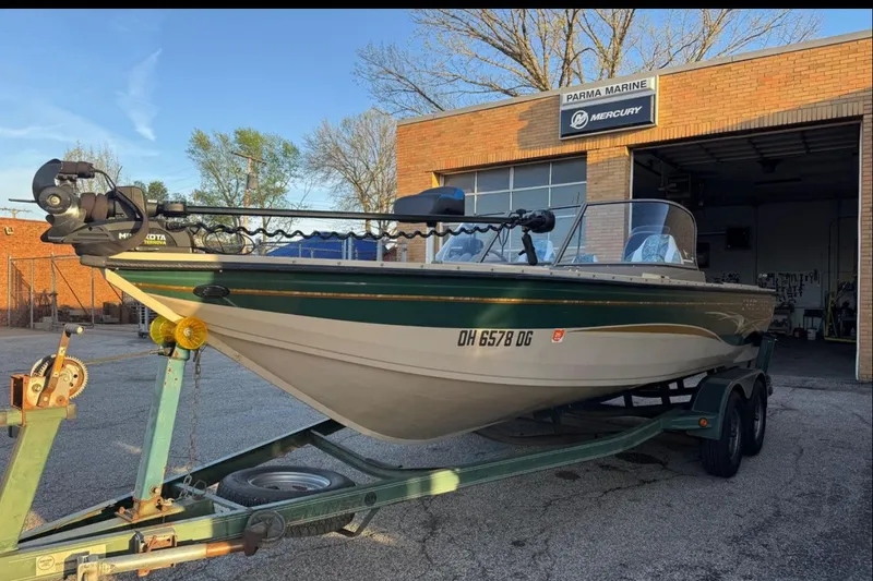 Slide: The Image of 2003 Crestliner Tournament 202 boat on trailer at Parma Marine dealership. - 3