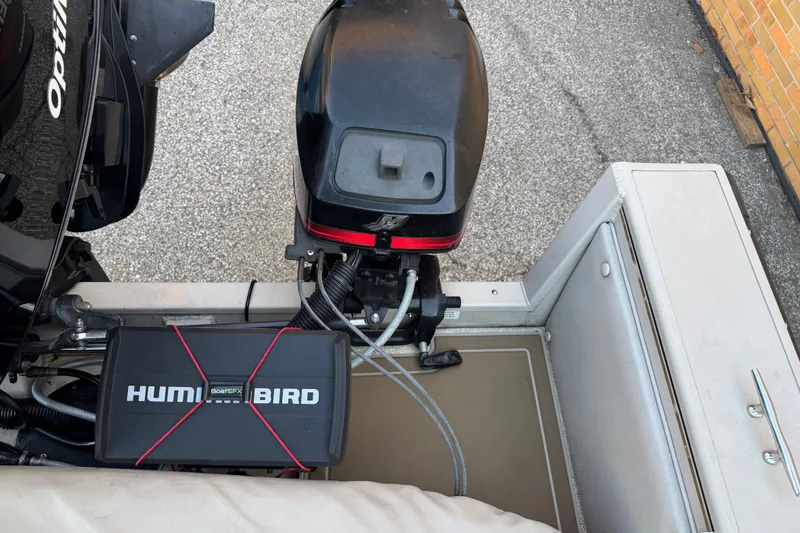 Slide: The Image of 2003 Crestliner Tournament 202 SC boat with motor and Humminbird equipment. - 28