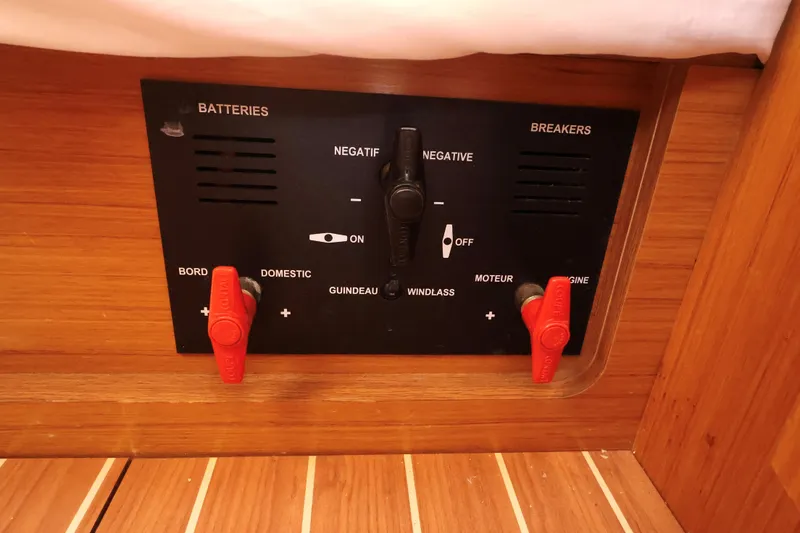 Slide: The Image of Electrical panel on a 2008 Jeanneau Sun Odyssey 36i sailboat, featuring battery and breaker controls. - 21
