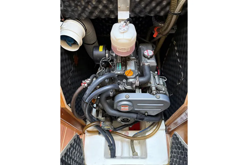 Slide: The Image of Engine compartment of 2008 Jeanneau Sun Odyssey 36i sailboat, showcasing detailed components. - 23