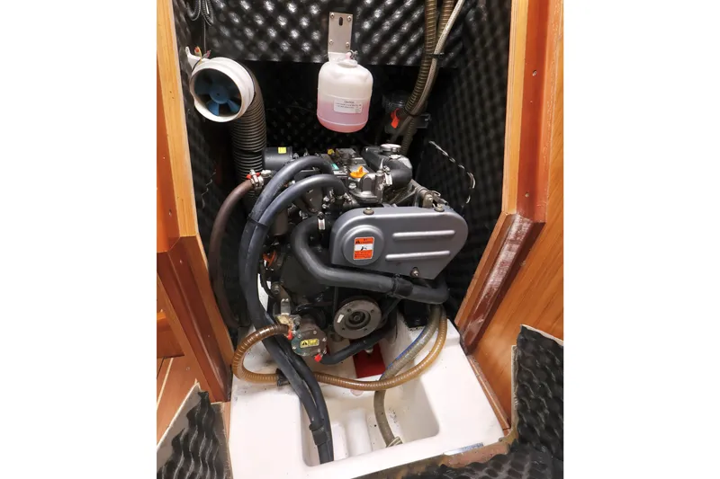Slide: The Image of Engine compartment of 2008 Jeanneau Sun Odyssey 36i sailboat, showcasing mechanical components. - 22